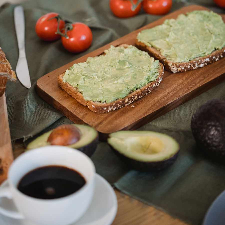 Delicious Paleo breakfast spread with fresh fruits, eggs, and nuts